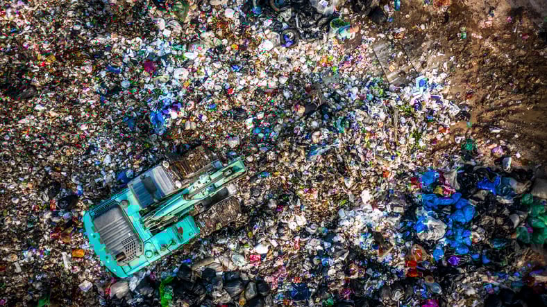 Plastic Bottle in a Landfill | Aqua ChemPacs